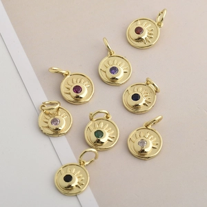 Golden sun-shaped evil eye pendants featuring colorful zircon stones for DIY jewelry making