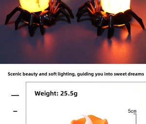 Detail view of a 5cm spider LED candle lamp with warm orange light and 25.5g weight info