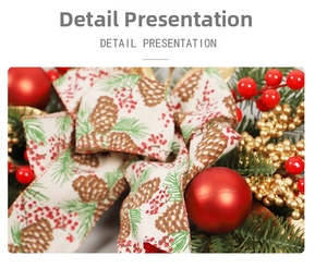 Detail of Christmas wreath featuring pine cones, red berries, and fabric bow decoration