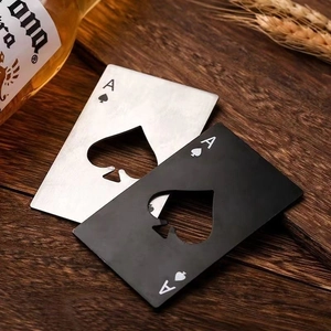Macro shot of silver and black stainless steel Ace of Spades card bottle openers