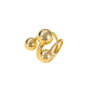 Detailed view of the gold adjustable orbital ring featuring three polished metal spheres