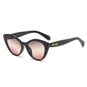 Trendsetting cat-eye sunglasses for women with black thick frame and gradient lenses
