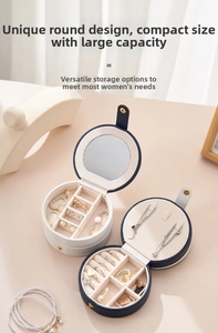 Internal view of portable jewelry case with built-in mirror and multi-compartment storage