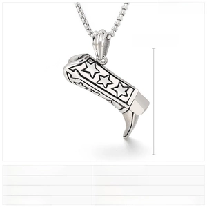 Macro detail of punk boot pendant featuring star pattern and polished steel finish