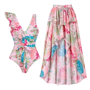 Pink floral ruffle one-shoulder swimsuit with matching high-low bohemian sarong skirt