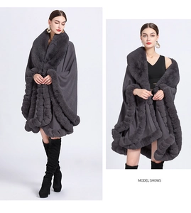 Front and back view of a grey knit shawl with faux rabbit fur collar on a model