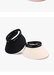 Detail of wide brim PVC sun hats with MENG LAN DI printed headbands in black and pink