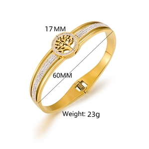 Polished stainless steel Tree of Life bangle with white crystals and spring clasp