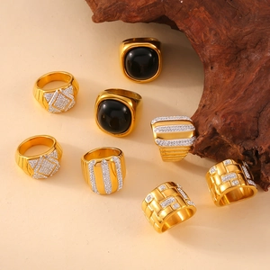 Set of 8 gold titanium steel rings featuring black agate and geometric diamond accents