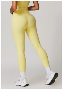 Detail view of high waist yoga leggings with V-shaped back stitching for a lifting effect