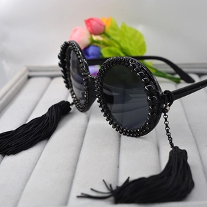 Vintage round sunglasses with black bead trim and long hanging fringe tassels