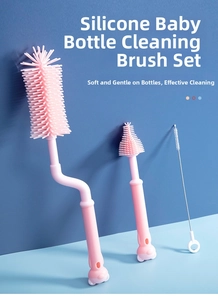 Detailed view of 3-piece pink silicone baby bottle brush set with soft suction tube cleaner