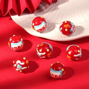 Macro detail of red ceramic beads with lucky Chinese characters for DIY jewelry