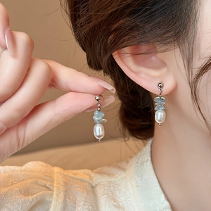 Elegant floral silver needle earrings with blue stones and baroque pearl tassels