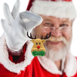 Detailed view of handmade reindeer Christmas ornament with felt texture and festive colors