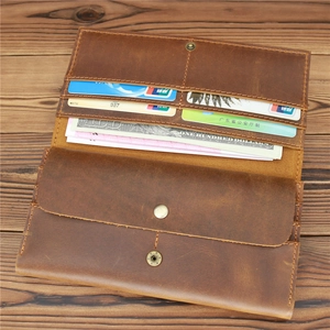 Detail of vintage brown crazy horse leather long wallet interior with multi-card slots