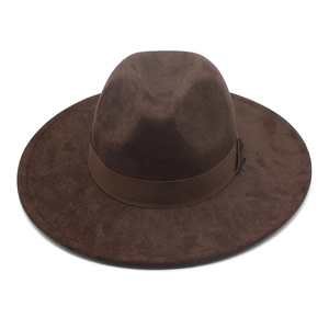 Detail of deep brown suede fedora hat with wide brim and matching grosgrain ribbon band