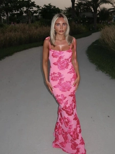Elegant backless floral maxi dress with pink base and red flower print for summer parties