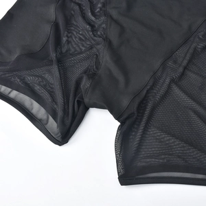 Detail of black mesh patchwork with breathable large pores on hollow-out summer set
