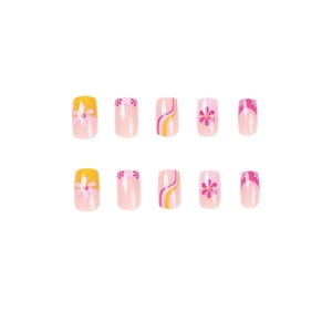French tip press-on nails with yellow and pink floral patterns on a white background