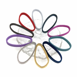 Elastic stainless steel mesh bracelets in multiple colors like gold, silver and blue