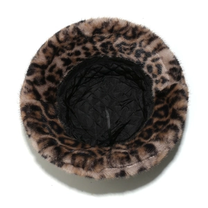 Detail view of leopard faux fur bucket hat with quilted lining and adjustable drawstring