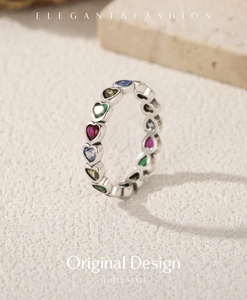 Detail of vintage S925 sterling silver ring with colorful heart-shaped gemstones