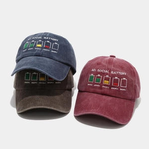 Three vintage washed cotton baseball caps with My Social Battery embroidery in multiple colors