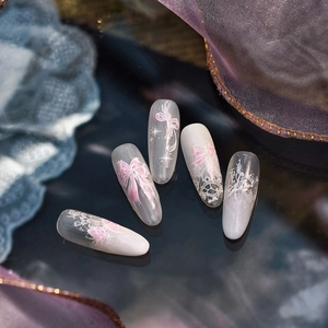 Glazed butterfly embossed nail stickers with pink bowknot and lace textures