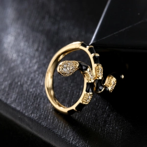 18K gold plated snake ring with black enamel and cubic zirconia in a wrap design