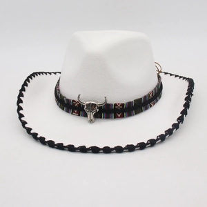 White felt Western cowboy hat with colorful ethnic band and silver bull skull ornament