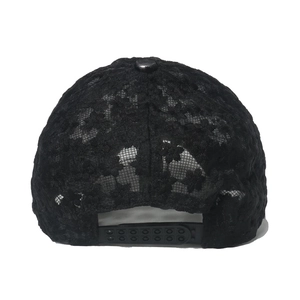 Women's black lace baseball cap with floral embroidery and snapback closure in rear view