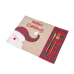 Linen Christmas placemat with Santa Claus embroidery and a pocket for cutlery set