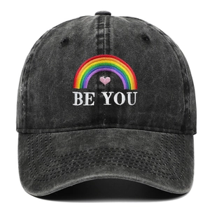 Washed black cotton baseball cap with colorful rainbow Be You embroidery and pink heart
