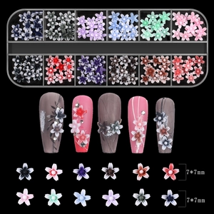 Detail view of 12-grid 3D resin flower nail charms set with 7mm size reference