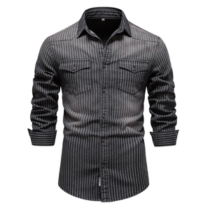 Detail of grey striped denim shirt with double chest pockets and washed texture