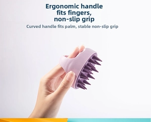 Ergonomic silicone hair massager brush in light purple with anti-slip handle grip