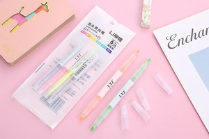 Close-up of dual-tip pastel highlighters set in six colors for student journaling