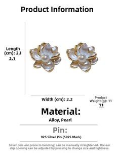Detailed view of cream floral earrings with pearl center and S925 silver pins