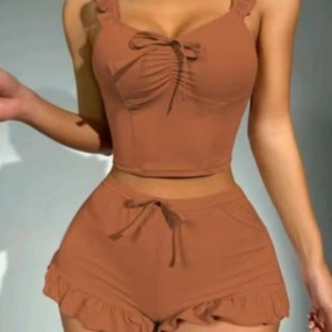 Sexy caramel two-piece set featuring ruffled camisole top and matching high waist shorts