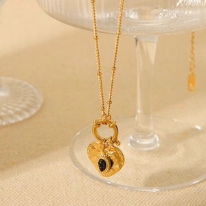 French vintage gold stainless steel heart necklace with black stone and hammered texture
