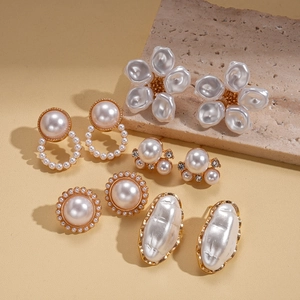 Ten-piece elegant faux pearl and diamond floral stud earrings set with vintage gold accents