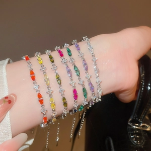 Close-up of elegant colorful marquise cubic zirconia bracelets with adjustable silver chains