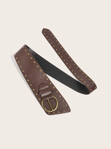 Close-up of vintage dark brown leather punk belt with golden studs and metal buckle