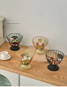Detail of coffee capsule basket with geometric iron lines and a metal COFFEE plate