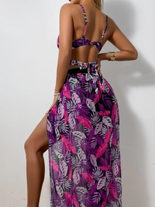 Three-piece bikini set with tropical leaf print and high-slit mesh skirt detail