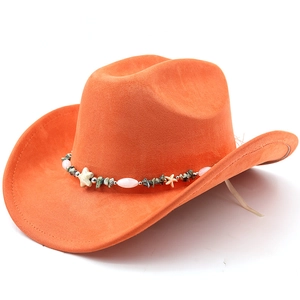 Detail of orange suede cowboy hat featuring a beaded chain with starfish and natural stones