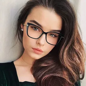 Retro cat-eye TR90 blue light blocking glasses with gold metal temples worn by model