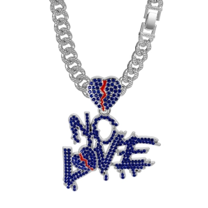 Close-up of NO LOVE heart pendant with blue and red rhinestones on silver cuban chain