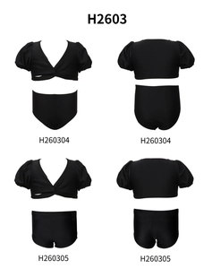 Flat lay of black two-piece girls bikini set with puff sleeves and v-neck detail